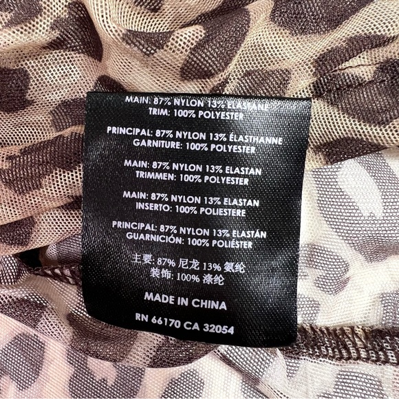 Lazy Oaf G.E.M Sheer Leopard Top with Pink
Faux Fur Trim Size XS - Picture 6 of 7